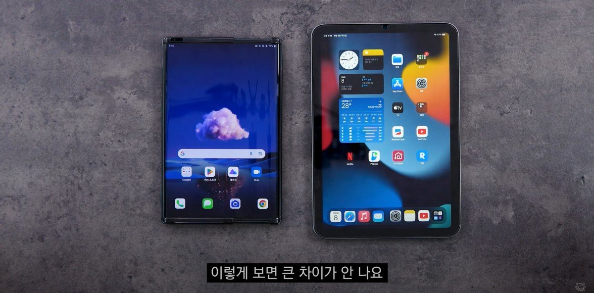 LG Rollable next to a tablet